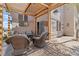 Inviting patio with pergola and outdoor seating, perfect for relaxing and entertaining guests at 6405 Eagle Feather Trl, Littleton, CO 80125