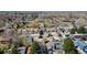 Overhead shot of a neighborhood featuring diverse housing, mature landscaping, and street access at 1225 Baker St, Longmont, CO 80501
