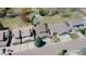 Aerial shot of homes with a green space and a nearby walking path, providing picturesque views at 1225 Baker St, Longmont, CO 80501