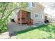 Backyard of a two-story house with a wooden porch at 1225 Baker St, Longmont, CO 80501