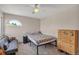 Bedroom with a large window, and modern dresser at 1225 Baker St, Longmont, CO 80501