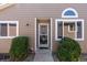 Home featuring a decorative security door and well-maintained front yard at 1225 Baker St, Longmont, CO 80501