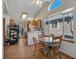 Bright kitchen with a breakfast nook and a window with natural light at 1225 Baker St, Longmont, CO 80501
