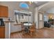 Bright kitchen nook with a breakfast table and a sunny window at 1225 Baker St, Longmont, CO 80501