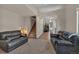 Living room showcases open floor plan and staircase at 1225 Baker St, Longmont, CO 80501