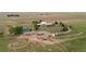 Large home with a tennis court and outbuildings at 11881 County Road 37, Fort Lupton, CO 80621
