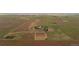 Acreage view of property featuring home, pond, barn and tennis court at 11881 County Road 37, Fort Lupton, CO 80621