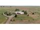 Country home on acreage with a circular driveway at 11881 County Road 37, Fort Lupton, CO 80621