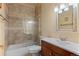 This remodeled bathroom offers updated shower and vanity with sleek finishes at 11881 County Road 37, Fort Lupton, CO 80621