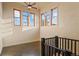 Hallway has wood floors and large windows that bring in natural light at 11881 County Road 37, Fort Lupton, CO 80621