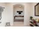 Hallway leading to another room, complemented by neutral walls and a table with decor at 11881 County Road 37, Fort Lupton, CO 80621