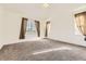 Large bedroom with carpet, neutral paint, and lots of natural light at 371 Granby Way # C, Aurora, CO 80011