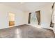 Bright bedroom features neutral paint, carpet, large window and ensuite bathroom at 371 Granby Way # C, Aurora, CO 80011