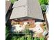 Overhead view of the home highlighting the backyard patio and landscaping at 6630 E Virginia Ave, Denver, CO 80224