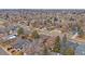 Residential neighborhood aerial view showing a house with mature trees at 6630 E Virginia Ave, Denver, CO 80224