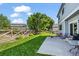 Backyard featuring a well-manicured lawn, fenced yard, and patio set at 11861 Fairplay St, Commerce City, CO 80603