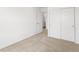 This bedroom has neutral carpet, white walls and a double door closet at 546 Red Rock Pl, Brighton, CO 80601