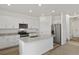 Modern kitchen with stainless steel appliances, granite counters and ample cabinet space at 546 Red Rock Pl, Brighton, CO 80601