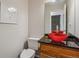 Bathroom featuring a vessel sink, modern fixtures, and a granite countertop at 11716 W Belleview Dr, Littleton, CO 80127