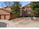 Inviting exterior showcasing a two-story home with natural landscaping and private parking at 9409 W 89Th Cir, Broomfield, CO 80021