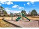 Community playground with slides, swings, and climbing equipment, providing a fun and safe play area for children at 12933 E Louisiana Ave, Aurora, CO 80012