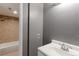 Bathroom with a single sink and a combined shower and tub with tile surround at 14204 E 1St Dr # A12, Aurora, CO 80011
