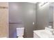 Bathroom with neutral tile surround, a white vanity, and modern fixtures at 14204 E 1St Dr # A12, Aurora, CO 80011