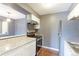 Kitchen with white cabinets, granite countertops, and stainless-steel appliances at 14204 E 1St Dr # A12, Aurora, CO 80011