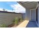 Private patio with plantings offers a relaxing outdoor space at 14204 E 1St Dr # A12, Aurora, CO 80011