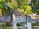 An aerial view of the home reveals its well-kept yard, classic architecture, and quiet neighborhood at 3565 S Holly St, Denver, CO 80237