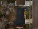 Aerial view of a home showing the roof, yard, and surrounding neighborhood at 3565 S Holly St, Denver, CO 80237