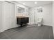 Renovated bathroom with granite countertop vanity, walk-in shower, and tiled flooring at 3565 S Holly St, Denver, CO 80237