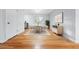 Elegant dining room with hardwood floors, stylish decor, and plenty of natural light at 3565 S Holly St, Denver, CO 80237