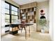 Bright home office with built-in shelving and large windows at 4642 Tennyson St # 26, Denver, CO 80211