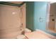 Functional bathroom with a shower-tub combo, vanity, and other essential fixtures at 12158 W Dorado Pl # 204, Littleton, CO 80127