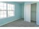Bright bedroom with large window and closet perfect for storage and relaxation at 12158 W Dorado Pl # 204, Littleton, CO 80127