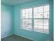 Bright bedroom with natural light and window offering neighborhood views at 12158 W Dorado Pl # 204, Littleton, CO 80127