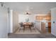 This staged dining area is adjacent to the kitchen and is perfect for entertaining friends and Gathering at 12158 W Dorado Pl # 204, Littleton, CO 80127