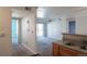 The living room features access to the balcony, with easy access to other rooms of the house at 12158 W Dorado Pl # 204, Littleton, CO 80127