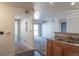 Living area with open space, fireplace, and sliding glass doors to outdoor balcony at 12158 W Dorado Pl # 204, Littleton, CO 80127