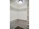 Spacious walk-in closet with built-in shelves and ample storage space for clothes and accessories at 12158 W Dorado Pl # 204, Littleton, CO 80127