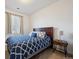 Comfortable bedroom with carpet and large window providing natural light at 27957 E 9Th Dr, Aurora, CO 80018