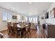 Open-concept living room featuring hardwood floors and lots of natural light at 27957 E 9Th Dr, Aurora, CO 80018