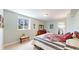 Cozy bedroom with a large window, dresser, and charming decor creating a relaxing space at 1738 Edgewater Pl, Longmont, CO 80504