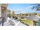 Charming front porch with white Adirondack chairs and scenic neighborhood views at 1738 Edgewater Pl, Longmont, CO 80504