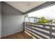Cozy balcony space with views of the complex parking lot at 7665 E Eastman Ave # 202A, Denver, CO 80231