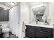 Full bathroom featuring modern fixtures, vanity with a mirror, and a shower with curtain at 7665 E Eastman Ave # 202A, Denver, CO 80231