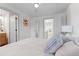 Bright bedroom with a comfortable bed and access to a bathroom at 3756 Decatur St, Denver, CO 80211