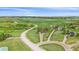 Wide aerial view of a property with dirt roads and green landscapes showcasing the community at 3163 Windstream Ln, Elizabeth, CO 80107