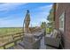 Well-appointed deck area with cozy seating and stunning views, perfect for outdoor entertaining at 3163 Windstream Ln, Elizabeth, CO 80107